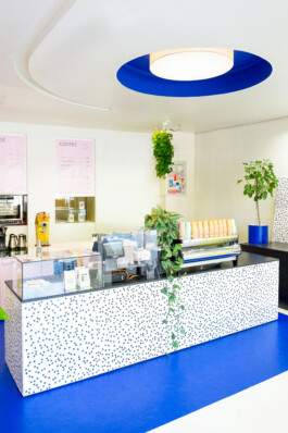 Geometric shapes and dynamic patterns create a visually engaging space at One for the Road before matter, architecture & interior design studio Frankfurt am Main