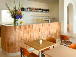 Terracotta tiles at the bar in Bon'gu creating a rustic Mediterranean-inspired design. before matter interior design frankfurt before matter, architecture & interior design studio Frankfurt am Main