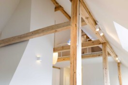 Exposed wooden beams in Kennedyallee highlighting the building's architectural heritage before matter, architecture & interior design studio Frankfurt am Main