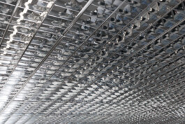 Minimalist interior design of einszwei café with open layout and stainless steel bar before matter, architecture & interior design studio Frankfurt am Main